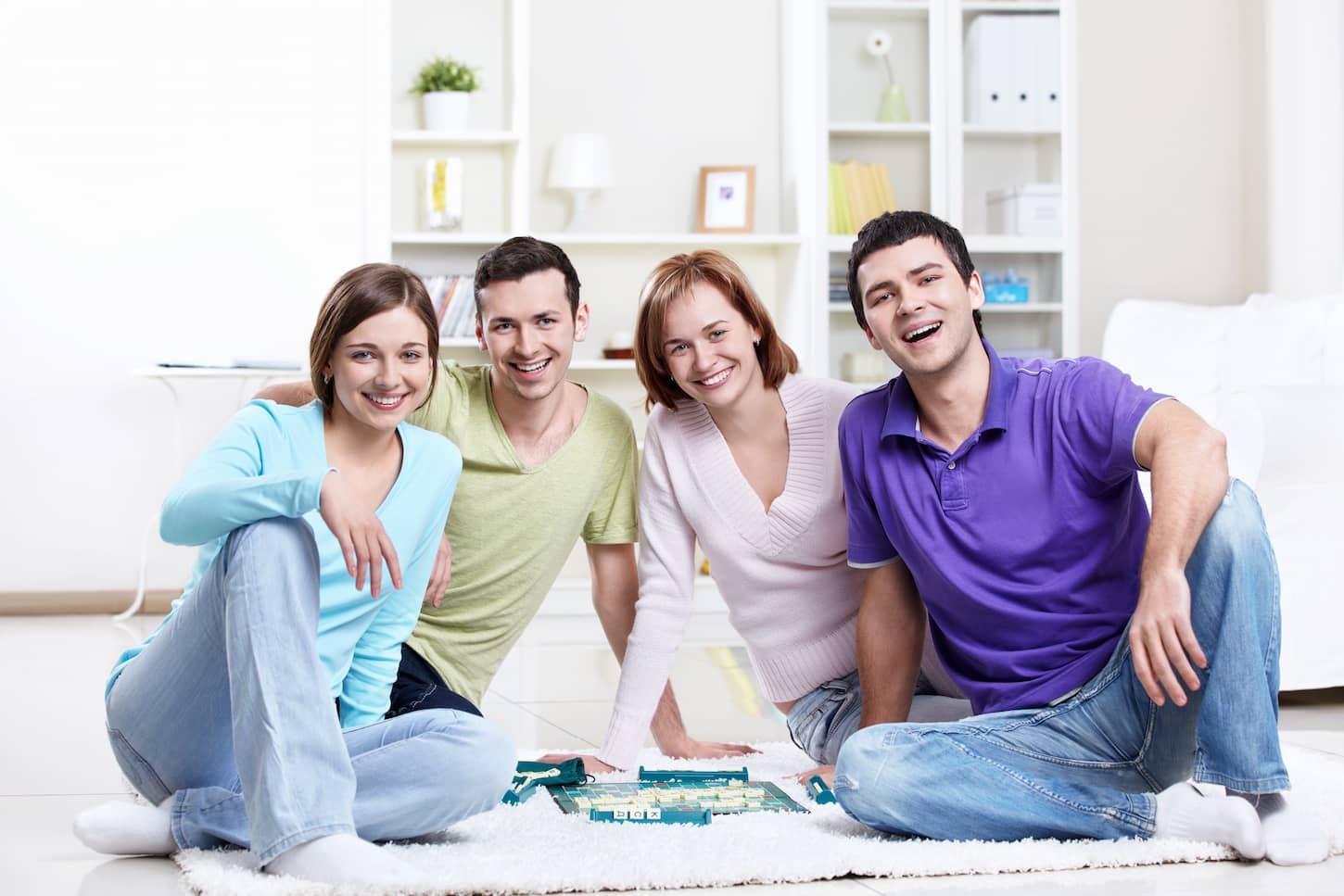An image of Young people playing Scrabble.