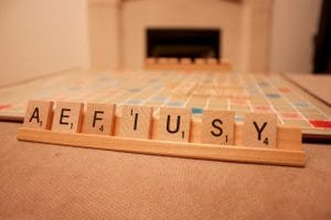 An image of a Scrabble board on game night.