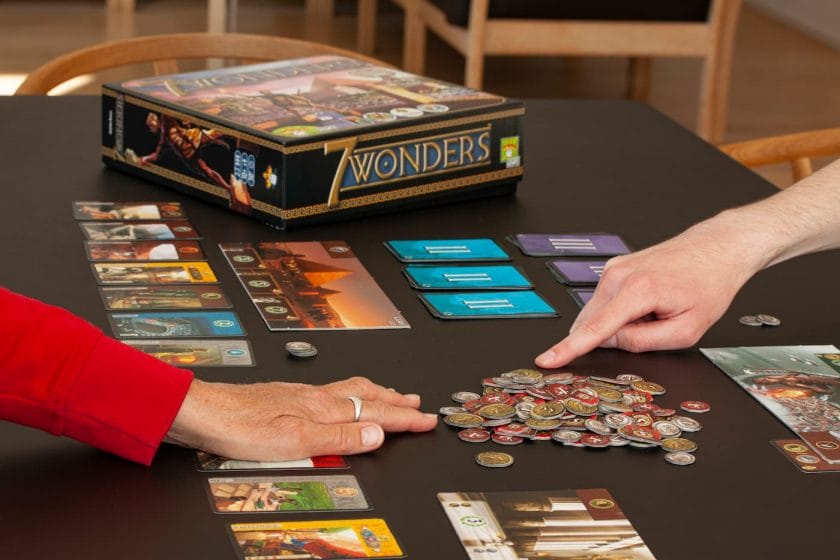 An image of people playing 7 wonders